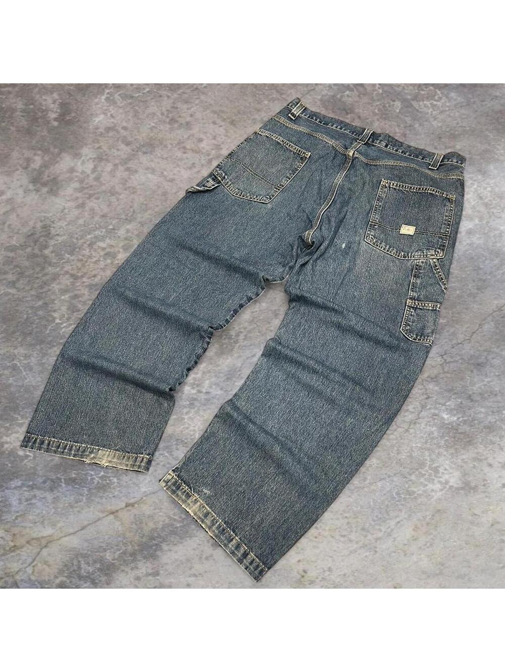 Dark wash, faded, straight leg carpenter jeans with a relaxed fit jeans